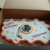 Redskins Cupcake Cake Made for a child's 7th birthday. Yellow cupcakes with buttercream icing. The Redskins' symbol is made from a frozen buttercream...