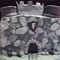 Castle Cake Made for ten year old birthday, buttercream with fondant accents, water is royal icing.He loved it and it was fun to make.