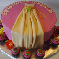 Bridal Shower Ivory dress and flowers with some cupcakes