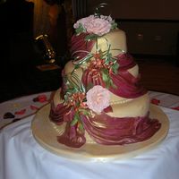 179.jpg HI, I made this cake for my niece's wedding.This was my first Fondant wedding cake. I cried a lot during the process,but in the end I...