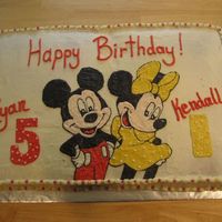 Mickey And Minnie BC frosting on a chocolate chip cake