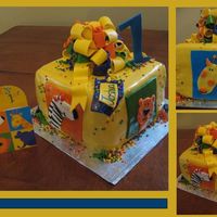 Jungle Animals Cake for my nephews first birthday and based on his invitation.