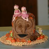 Tree And Pixies This is an attempt at Debbies Brown's Tree cake, she makes it look so easy for sure, I used all MMF for this, the cake is choc. with a...