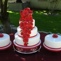 Red Sugar Roses This cake was a request by a bride who's entire wedding was adorned by red roses.