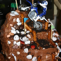 Mason's Dirt Bike Cake This was kind of a cake disaster but it tasted great and my son loved it. Based on one from a magazine. My cake was too moist and kept...