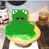 Frog Buttercream with fondant accents. I also put fake eyelashes on her, LOL