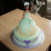 Princess And The Frog Cake Princess Tianna cake is fondant, the supporting cake is buttercream.
