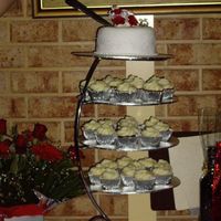 25Th Wedding Anniversary Cake This is a fruit cake fontant covered 6" cake. Which was a reconstruction of their orignal. Then 30 muffins in 3 varities carrot and...