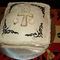 Anniversary Cake This is the cake I made for our fourth wedding anniversary. It is a yellow cake with cream cheese and strawberry filling and buttercream...