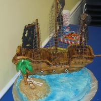 Pirate Ship Made this pirate ship cake for my nephews 3rd birthday. It is all edible except for the netting and the mast. Everything else is either BC...