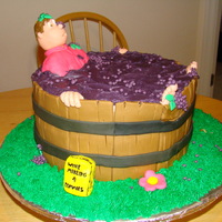 Grape Smashing Three 10 inch rounds layered in BC. Decorated in fondant.