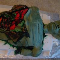 Alien Disection Cake covered in fondant. The head is rice krispy treat