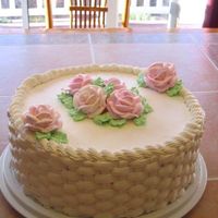 Bridal Shower Cake This is a cake i made for my sister's bridal shower. Very simple basketweave design and a few roses on top. The cake was chocolate...