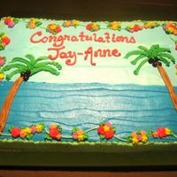 Luau Cake This is a cake i made for a Graduation Party. It was for about 80 people or so. It was yellow cake with WC, Bananas and Strawberries.