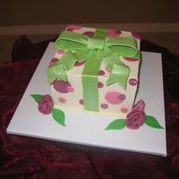 Giftbox With Roses 6" square with fondant/gumpaste bow and fondant accents. Cake is the Chocolate ItalianCream Cake from this website. It is truely...