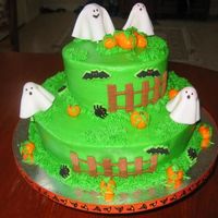 Ghosts In The Patch 6" yellow cake with strawberry and whipped cream filling, 10" chocolate fugde with chocolate buttercream. Fondant accents.