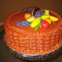 Thanksgiving 10 inch yellow cake with chocolate BC and marzipan fruits and vegetables.