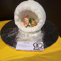 Ornament Cake Dummy cake carved and deocratesd royal icing and fondatn figures for local county fair