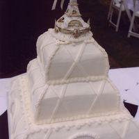 Eiffel Tower This design comes from a bridal magazine that originally showed it with rose pedals sprinkled along each tier and rose buds placed under...