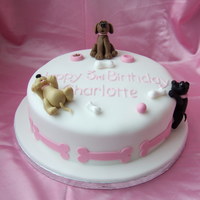 Playful Pups This was made for our friends daughter who is just crazy about puppies. If it had been a bigger cake (only 8") I would have loved to...