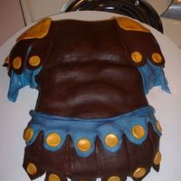 Rome This cake was done for a Rome themed party. It was based off of armor costumes from the HBO show Rome. Cake is covered in chocolate plastic...