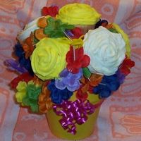 Cupcake Bouquet This is my first attempt at making a cupcake bouquet, Getting the cupcakes to stick and stay on the toothpicks was the biggest challenge....