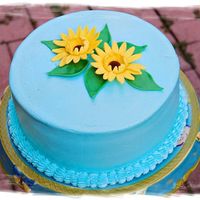 Blue Cake With Yellow Flowers Quick, last minute cake for my sister's 9th birthday. Not entirely what I had envisioned but it turned out alright even though I broke...