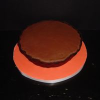 Reese's Cake This is supposed to look like a giant Reese's. The cake is, of course, a peanut butter cake with chocolate ganache. The base color is...
