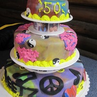 Groovy!! A cake for a friends 50th! He palys in a band and his wif put together an awesome ,"grrovy" 70's party. So I "tye dyed&...