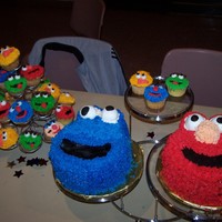 Sesame Street Friends A bunch od sesame street characters for my friend's baby's 1st birthday. Cookie Monster and Elmo done in 8 inch round and all...