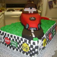 16Th Birthday I made this for my son's 16th birthday. Baked the car cake in a loaf pan and carved it. The driver is made out of gumpaste and fondant...