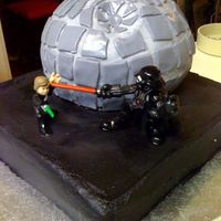 Death Star! I made this for my husbands birthday, very happy with the way it turned out. WASC both cakes with Buttercream and MMF accents. Lemon filled...