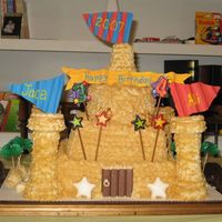 Sandcastle Cake I made this for my niece and nephew's shared b-day party. It was my first attempt with gum paste and my first time doing a really...