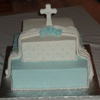 First Communion First communion cake, 12 inch and 8 inch square.First time doing a fondant drape; i was happy with it. BC iced, impression mat, bc dots and...