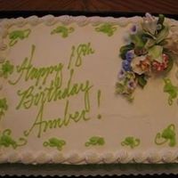 Daughter's Birthday This was made for my daughter's 18th birthday 1/2 sheet cake with BC icing and fondant flowers