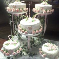 Quince Fondant cover cake with fondant roses border.