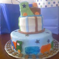 Train Around The Cake strawberry cake covered on fondant, decorated with a gum paste train