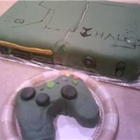 Video Game White cake covered on green fondant.