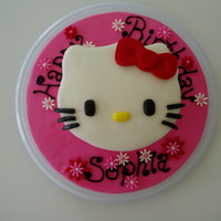 Hello Kitty Dairy free vanilla cake with buttercream frosting. Covered in mmf with mmf decorations.