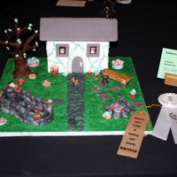 3D Garden Scene Cake This was an entry into my very first cake show and I won 3rd place for it...everthing was created with gumpaste such as the flowers, pond,...