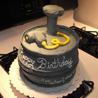 Keg This was 4 cakes stacked up and iced with grey coloring. The pump and the spout was made out of Rice Kripies. Everything else was made of...