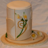 Art Deco Cake pink champagne and dark chocolate layers with raspberry white chocolate ganache. Fondant accents. From "Cakes to Inspire and Desire&...