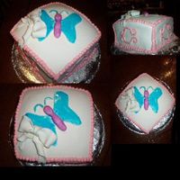 Butterfly Cake This is a layer square yellow cake with buttercream frosting and covered in marshmallow fondant. The butterfly and bow are also made with...
