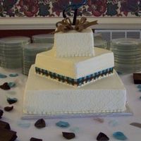 Robin's Cake Wedding cake from this weekend for a good friend. Had 5 other cakes, and catered the wedding. I can hardly move today! Impression mat was...