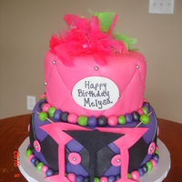 Martini Birthday White cake with raspberry filling and chocolate cake with barvarian cream filling. Cake sizes are 7 and 9 inch.