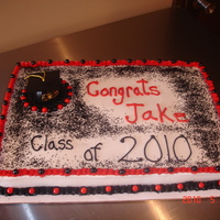 Jakes's Graduation Cake White sheet cake with buttercream frosting. Used black glitter on the top. I'm not sure I liked how it turned out but the graduate...