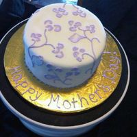 Mother's Day Cake A gift for Mother's Day, vanilla with dulce de leche filing. My first try attempting brush embroidery.