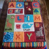 Baby Shower Quilt I made this 12x18 cake for my nephew and his wife, in Jan. 2009, for their baby shower. Entirely done in buttercream, it is patterned after...