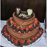Kenny's Groom Cake All chocolate groom's cake for my sister in laws brother. Chocolate cake, heart-shaped stacked, strawberry cream filling, cocoa...