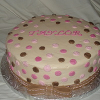 Baby Shower Vanilla cake with cream cheese filling, bc icing, name and dots, fondant bow w/bc "stitching".